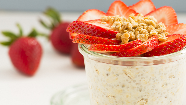 A nutritious breakfast couldn't be easier! Oats are mixed with milk, yogurt and chia seeds, then topped with sweet strawberries and crunchy granola.