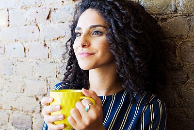 woman drinking coffee or tea