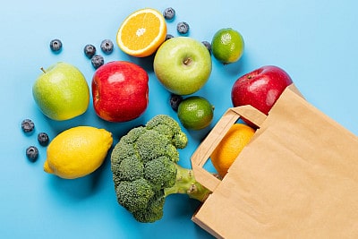grocery bag colorful fruits and vegetables